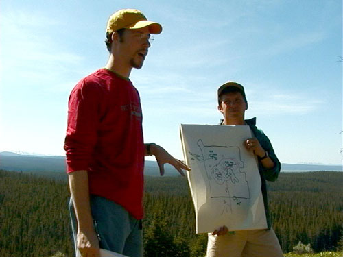 Student and trip leader with map.