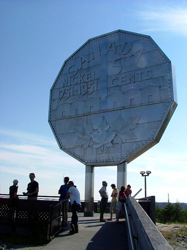 9 meter high sculpture of a nickel coin.