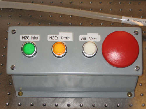 Small buttons read H2O inlet, H2O drain, Air Vent. The big red button is unlabeled.