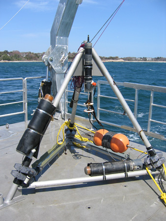 The sensor in tripod frame on deck.