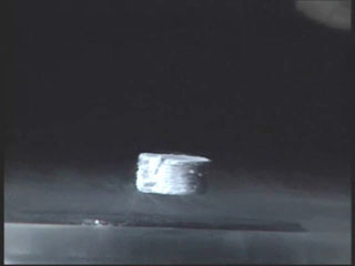 Magnet Floating Above a Superconductor.