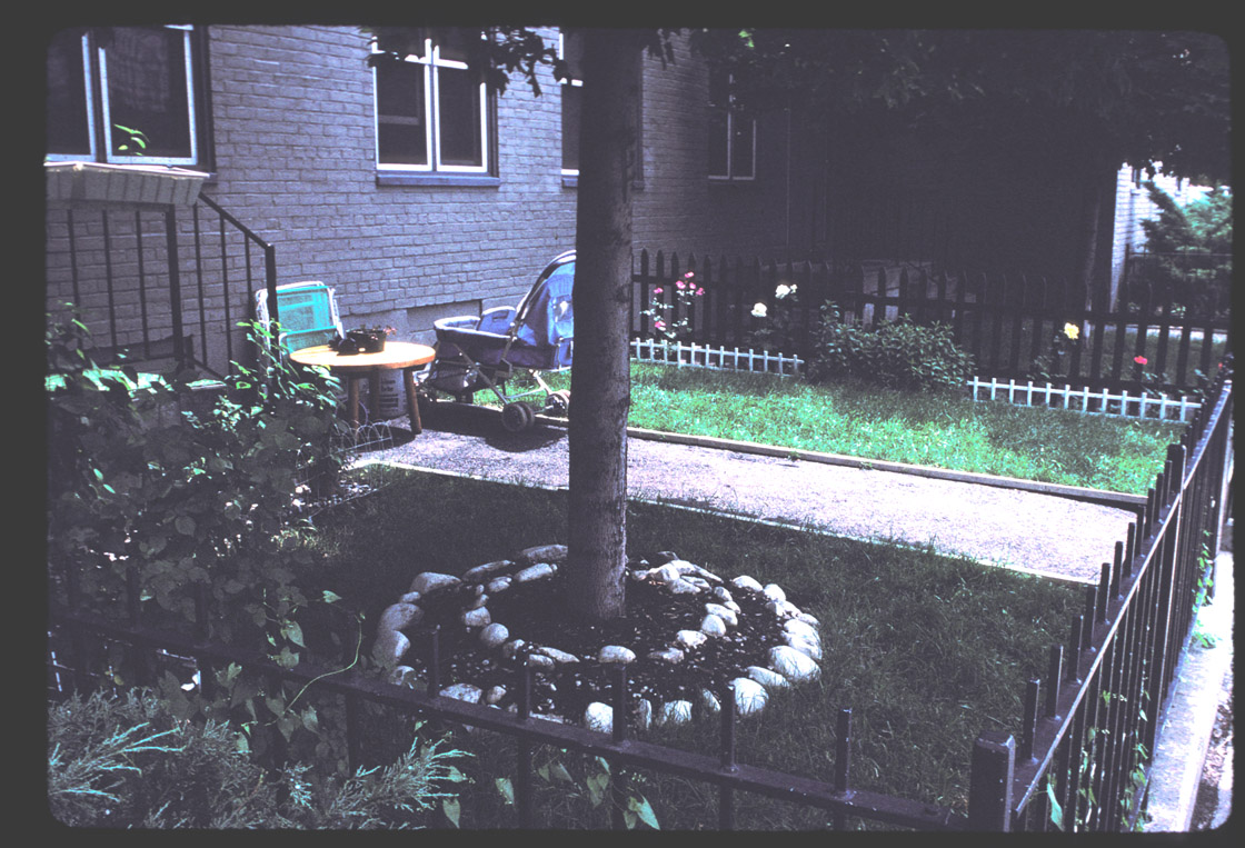 W. Broadway picket fences, privatized yards.