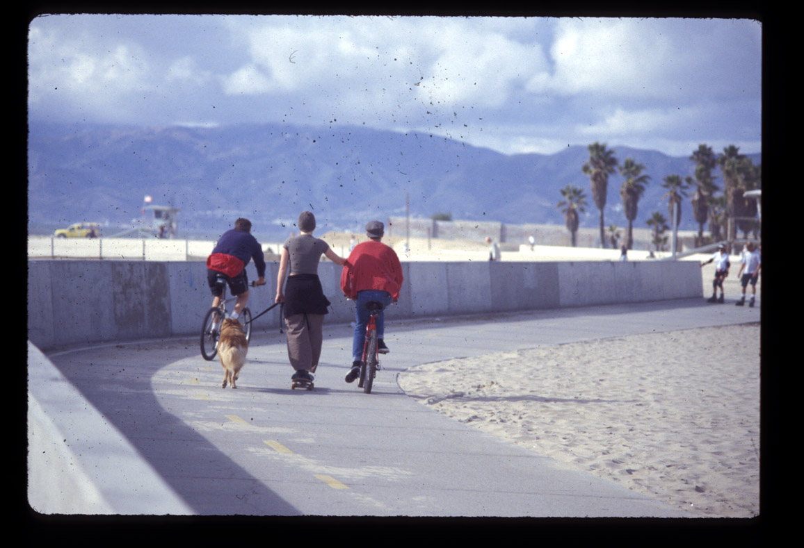 Venice Beach, CA, rolling with the dog, 11/98.