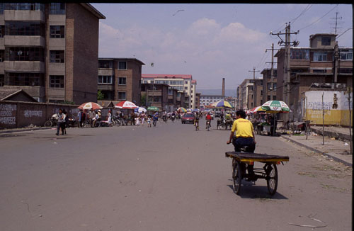 ͺеһС֡[View of a mixed residential/industrial district.]