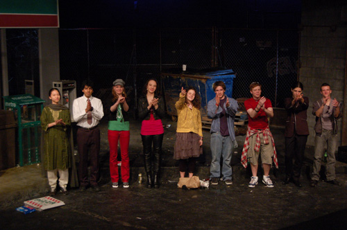 The cast, lined up for a bow.