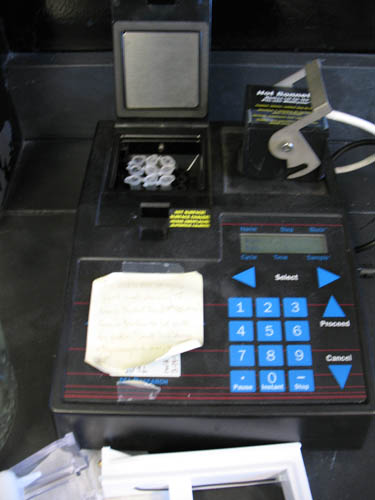 PCR thermocycler containing nine eppendorf tubes