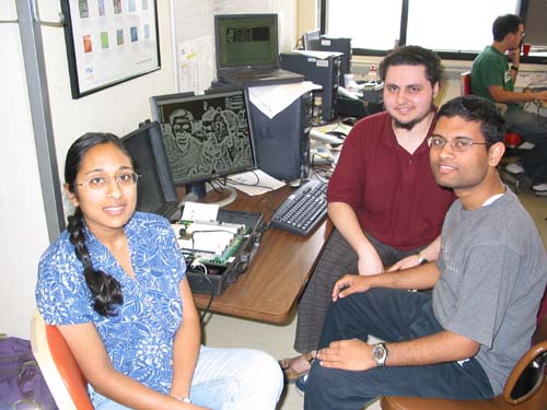 Students displaying their Caricatron project.