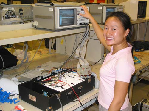 Student testing her group's Real-Time Motion-Activated Tracking System project.
