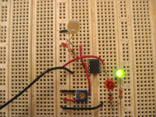 A green LED is lit when light strikes the photocell.