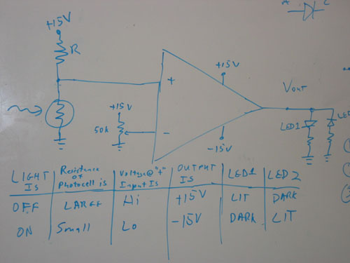 A schematic with the properties of a light sensing circuit.