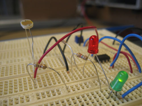 Light sensing circuit response when light strikes the photocell.