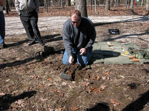 Digging a hole.