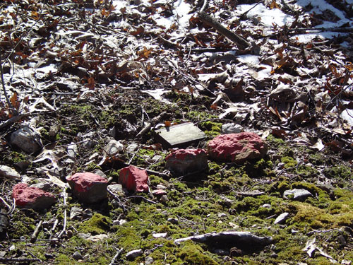 Emplaced shoe mine and markers.