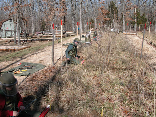 MIT class trying out manual demining techniques.