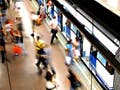 Passengers boarding a subway in Madrid.