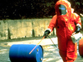 Level A personal protective clothing and equipment for air monitoring and hazardous waste sampling.