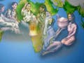Image of a group of people layered on a world map.