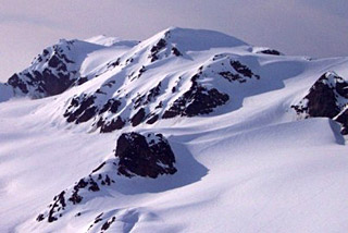 Photograph of a snow-covered glacier.