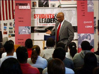 A photograph of Secretary Rod Paige at a speaking engagement.