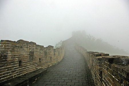 Fog surrounds the Great Wall.
