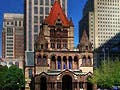Photograph of Trinity Church and surrounding buildings in downtown Boston.