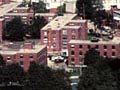 An aerial photo of many large brick apartment buildings.