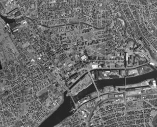 A black and white aerial photo of Lawrence, MA.