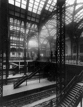 The concourse and steps leading down to the platforms at New York City's Penn Station, circa 1911.