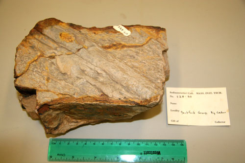 Sandstone with preserved tool marks. Paleo flow was parallel with tool marks, but exact direction of flow can not be known from tool marks.