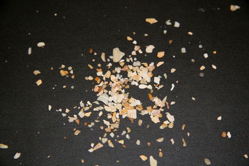 Immature with regard to physical and chemical weathering Beach sand with heavy Biological component, very angular and poorly sorted.