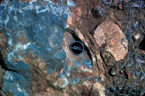 Arc volcanics above seafloor sediments.
