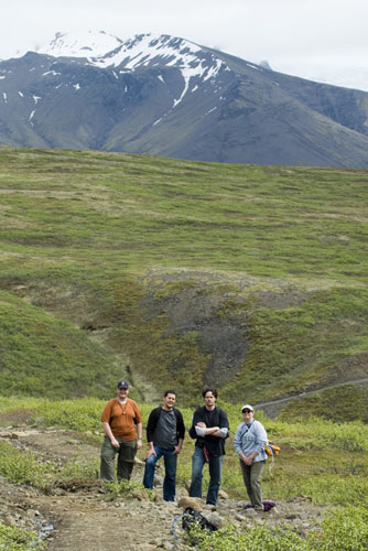 Students in front of mountains.