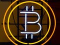 Bitcoin accepted here neon sign.