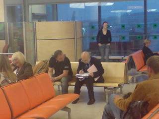 Photograph of people answering survey questions.