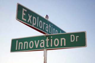 Street signs showing the corner of Exploration and Innovation Dr.