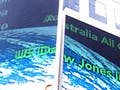 Phot of a billboard displaying a stock ticker.