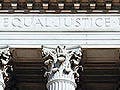 A photo of the top of the U.S. Supreme Court building.