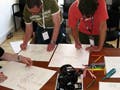 Photograph of group problem-solving.