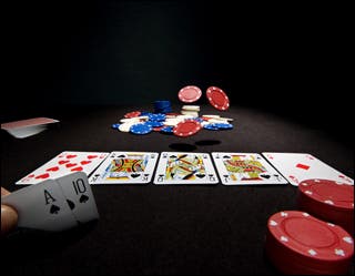 A hand of Texas Hold'em poker from the point of view of a player holding an ace high straight flush.