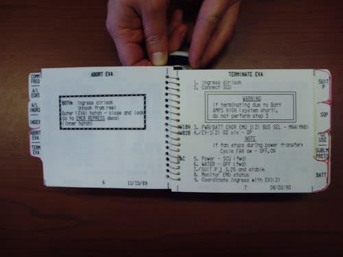 Instructions for aborting and terminating an EVA.