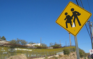 Roadside sign at the U.S.-Mexico border.