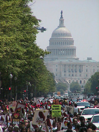 A photograph of protestors marching to the Whiote House.