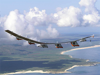 The Helios Prototype solar-electric flying wing in the sky.