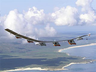 The Helios Prototype solar-electric flying wing in the sky.
