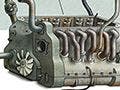 A car engine connected with pipes.
