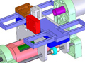 A CAD model of the lathe with major sections colored for clarity.