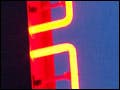 A neon sign that says "DRUGS".