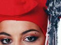 A Muslim woman dressed as Marianne wearing a phrygian cap. Text below reads 'I'm afraid Marianne today is in danger'.