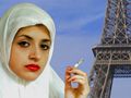 A woman wearing a chador head-scarf smokes a cigarette with the Eiffel Tower in the background.