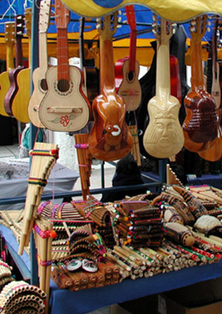 A photo of a stand selling handmade musical instruments.